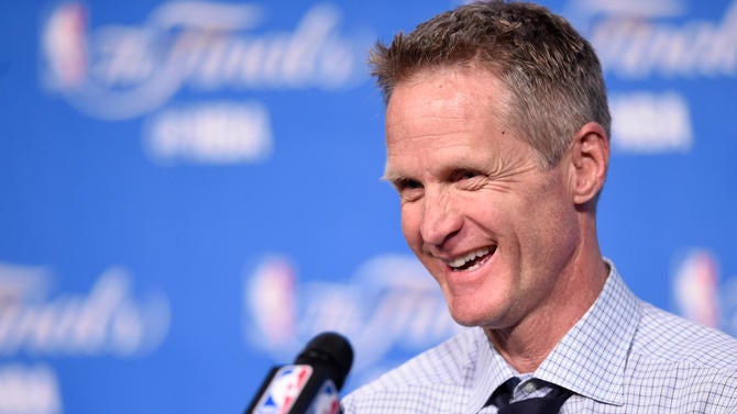 Steve Kerr has a laugh when talking to the media
