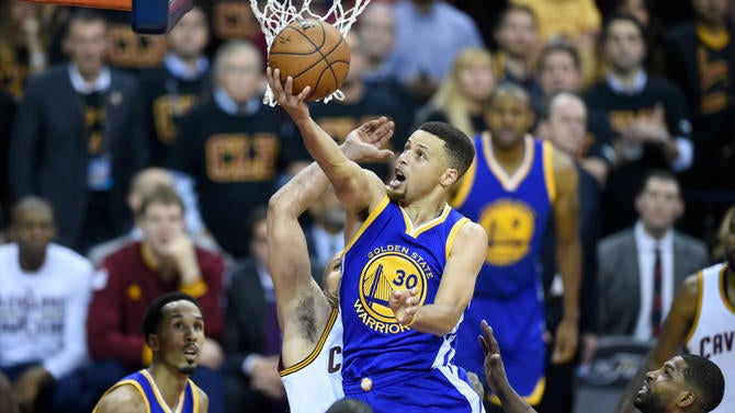 Stephen Curry goes to the basket in Game 6