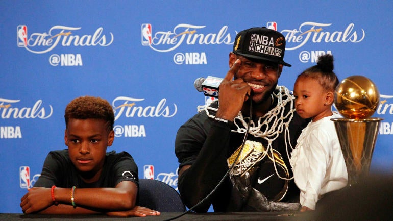 LeBron James and his kids at the podium after Game 7