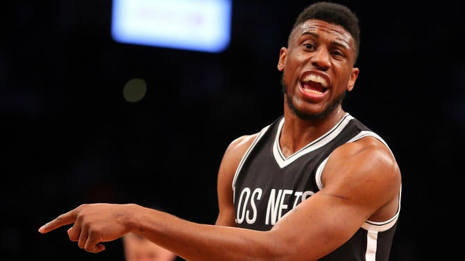 Thaddeus Young points at something at Barclays Center