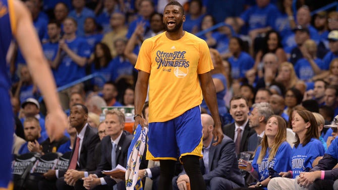 Festus Ezeli stands up