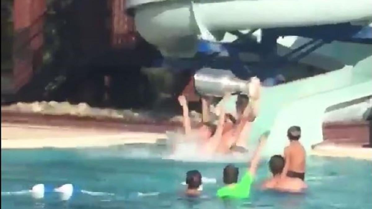 Jeff Zatkoff takes Stanley Cup down a water slide, because why not?
