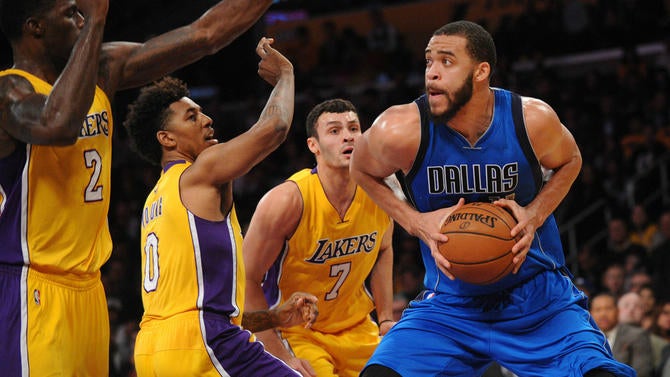 JaVale McGee surrounded by Lakers
