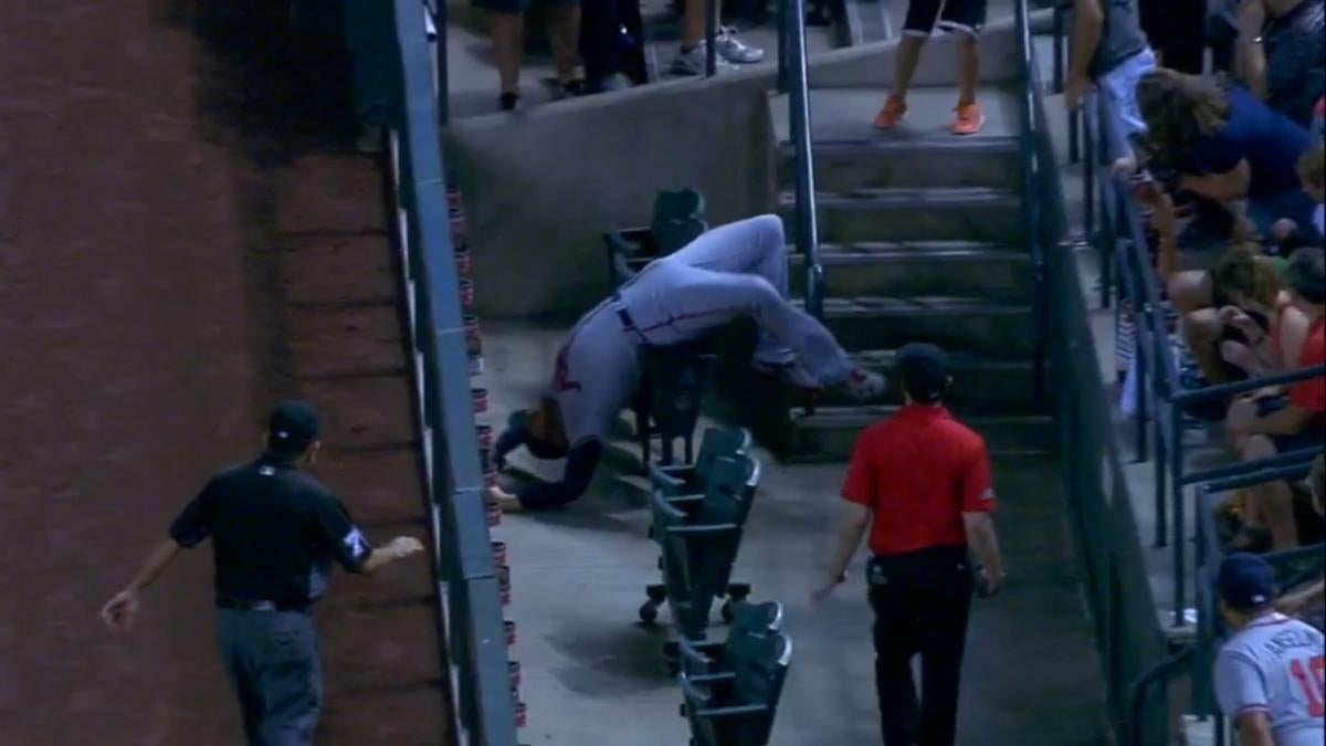 WATCH: Braves' Freddie Freeman flips over the railing to make a catch