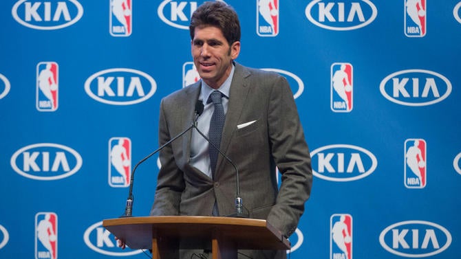Bob Myers talks at Stephen Curry's MVP press conference