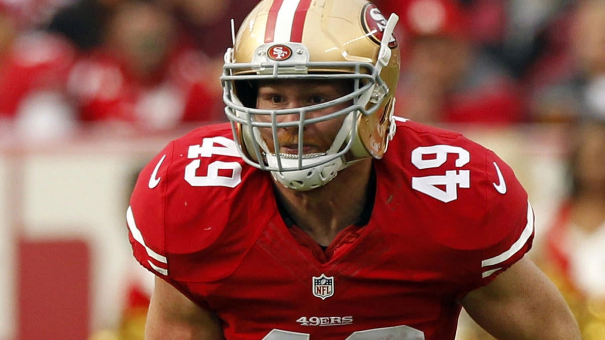 Fullback Bruce Miller of the San Francisco 49ers tries to tackle