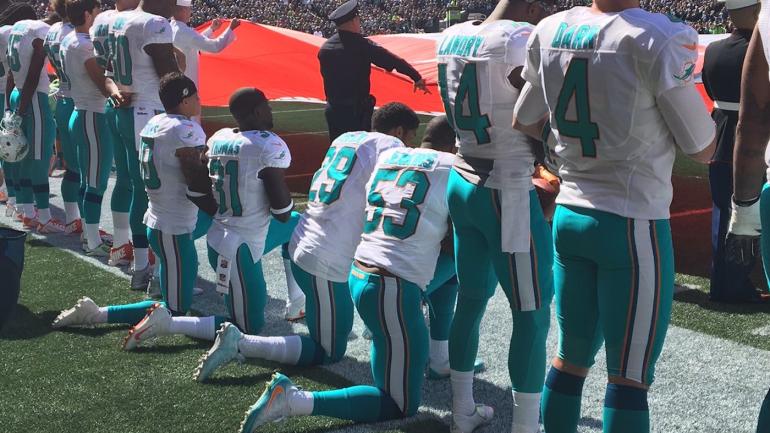 LOOK: Multiple Dolphins players take knee during national 