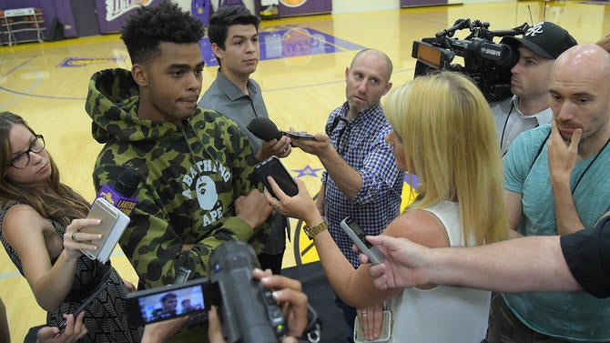 D'Angelo Russell talks to reporters