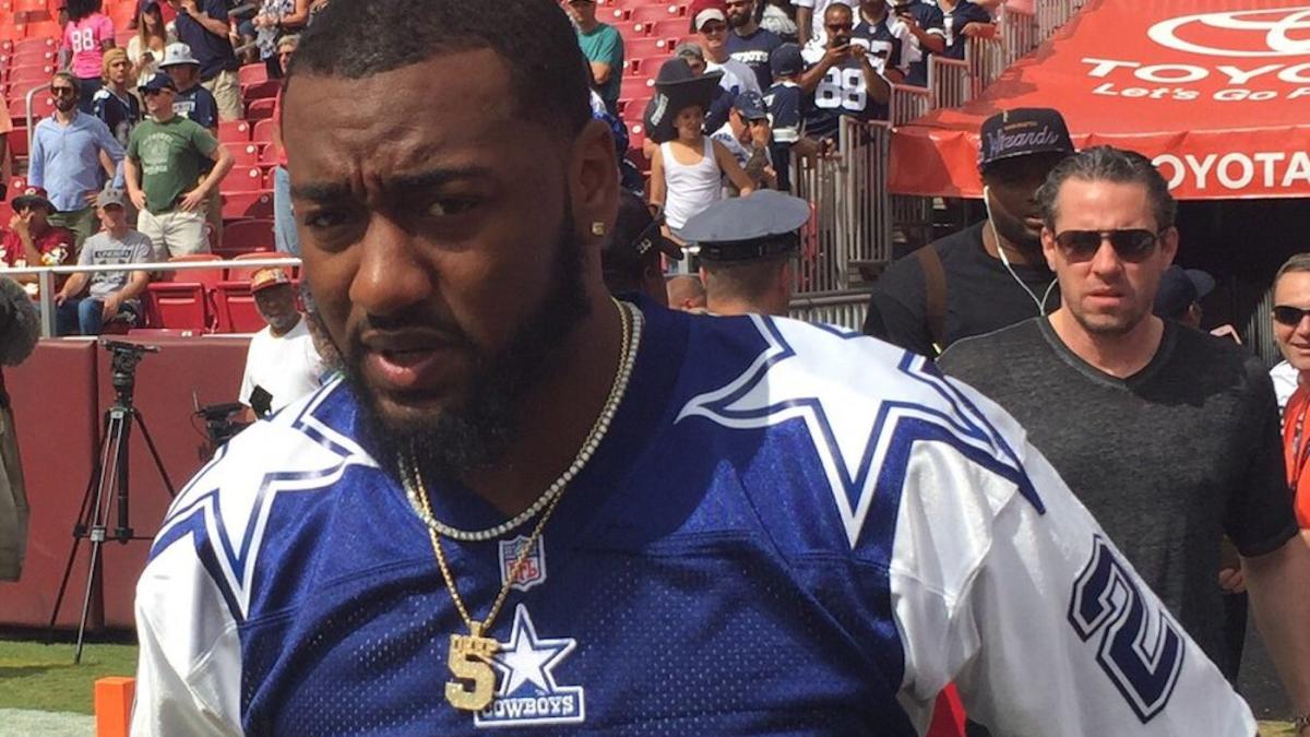 John Wall wears Cowboys jersey to Redskins game