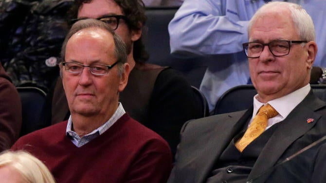 Phil Jackson and Bill Bradley watch a game