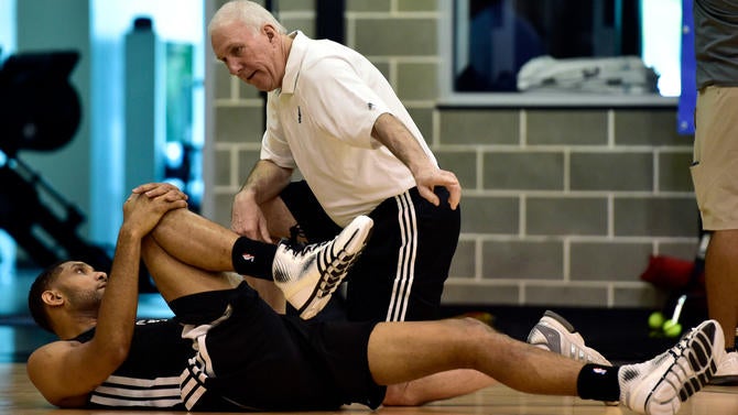 Gregg Popovich and Tim Duncan at the Spurs' practice facility
