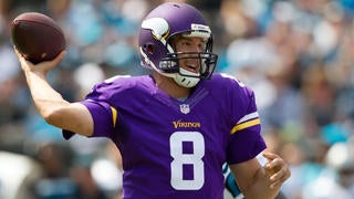 St. Louis Rams quarterback Sam Bradford smiles during warm ups at