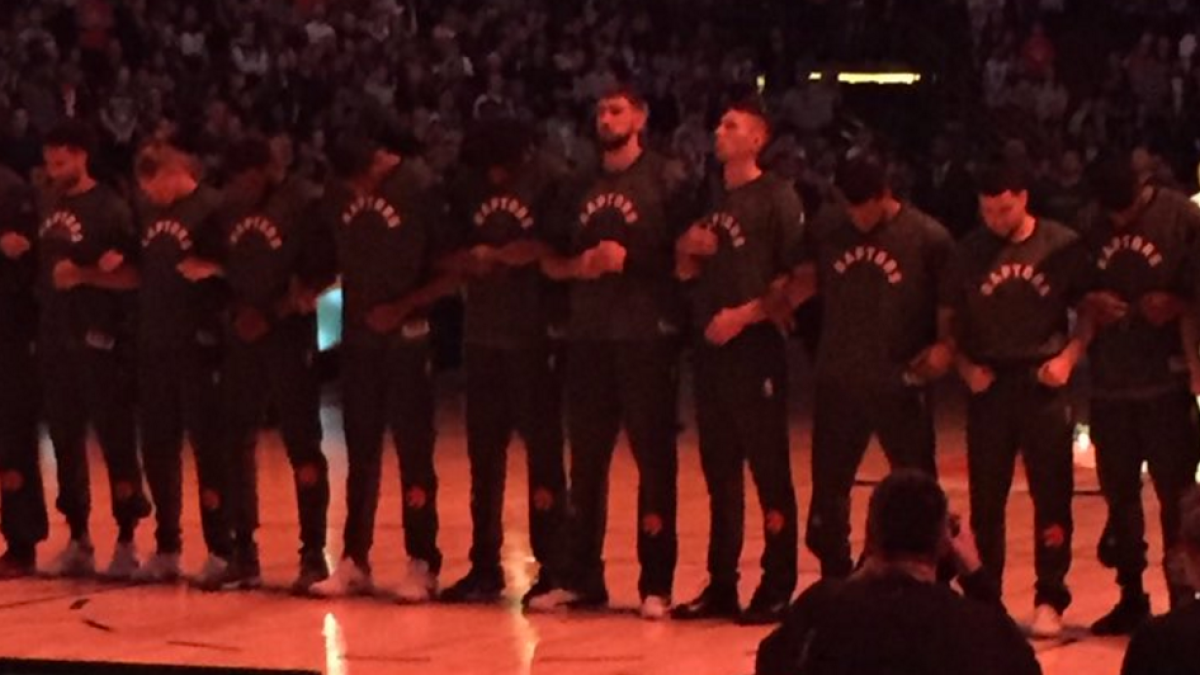 Raptors lock arms during national anthem before preseason game - CBS Sports