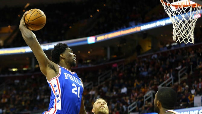 Joel Embiid flies in for a tomahawk dunk