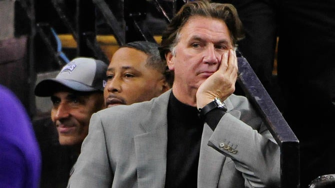 Geoff Petrie watches a game