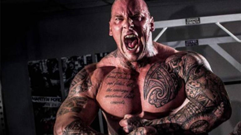 LOOK: Ripped 6-foot-8 bodybuilder 'The Nightmare' is 