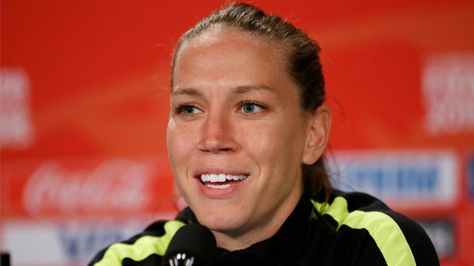 Lauren Holiday at a press conference