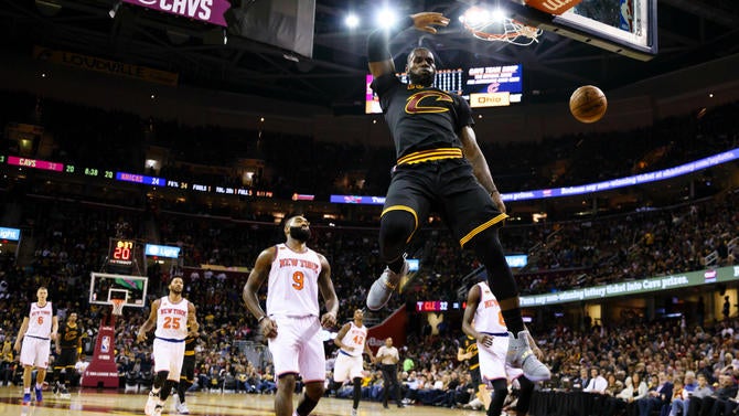 LeBron James dunks on opening night