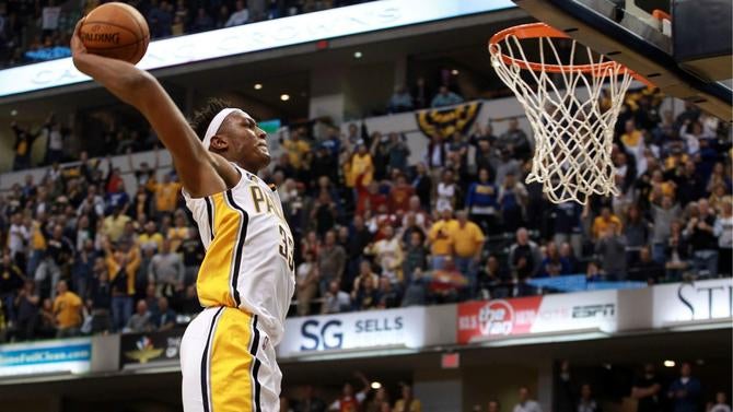 Myles Turner dunking in the Pacers' opener