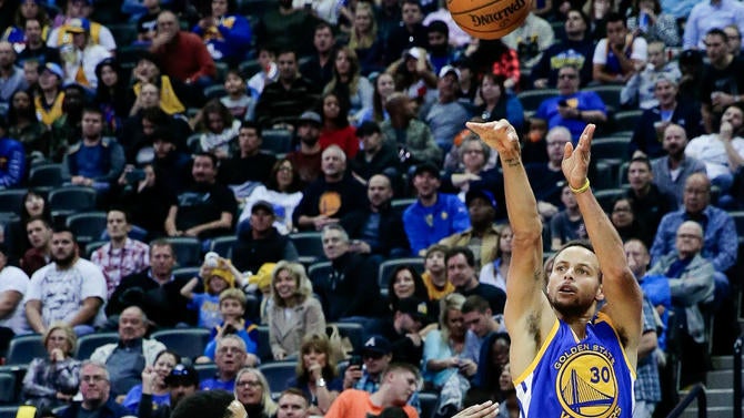 Stephen Curry shoots in Denver