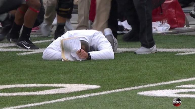 LOOK: Urban Meyer collapses in relief after Ohio State's 