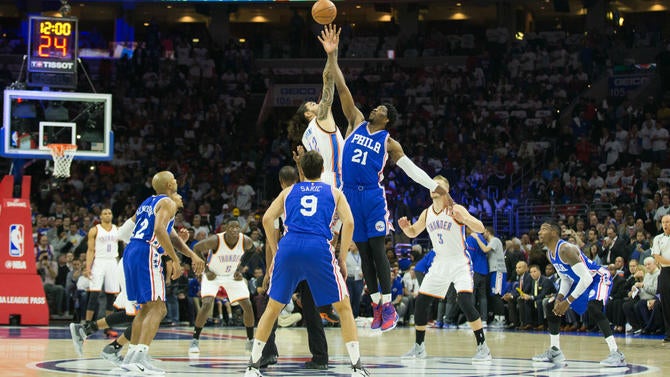 Joel Embiid and Steven Adams at tipoff on opening night