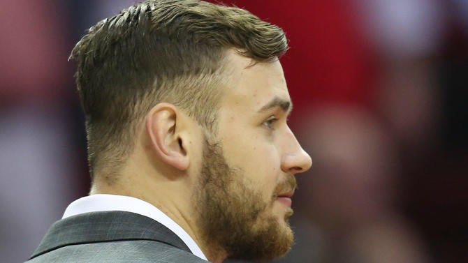 Donatas Motiejunas on the sideline