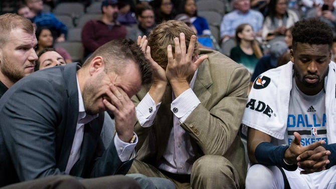 The Mavericks cover their eyes