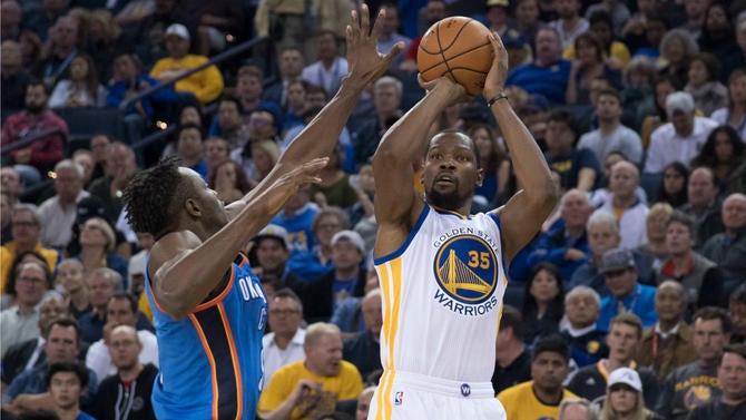 Kevin Durant shoots against the Thunder