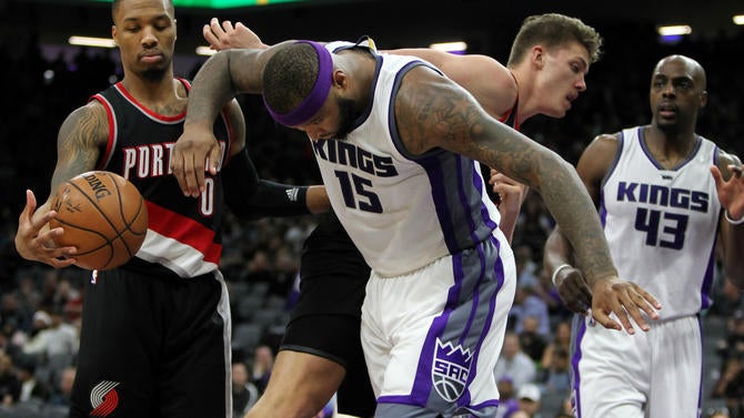 DeMarcus Cousins and Meyers Leonard, tangled up