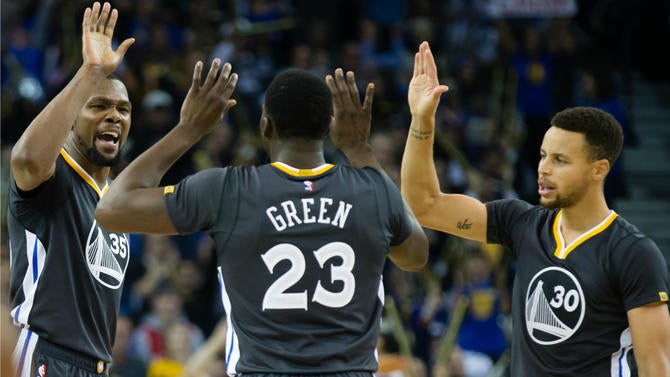 Kevin Durant, Draymond Green and Stephen Curry seem happy