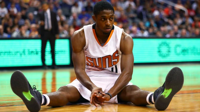 Brandon Knight sitting on the court