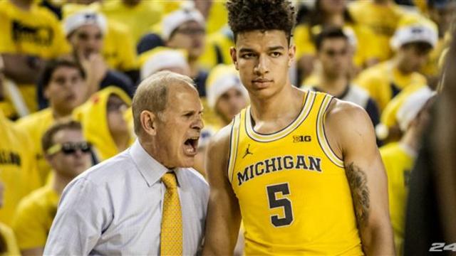 D J Wilson Scores 28 But Michigan Falls To Iowa In Overtime