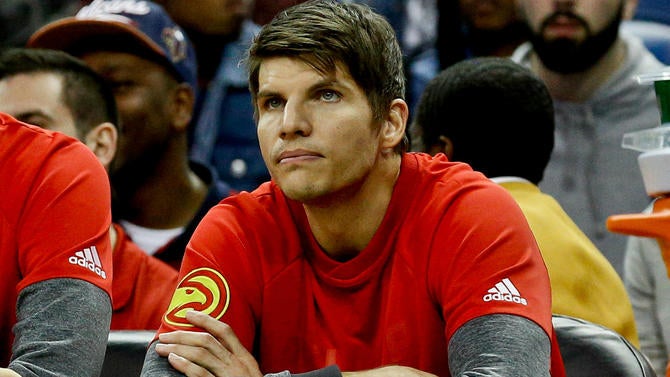 Kyle Korver watches the Hawks from the bench