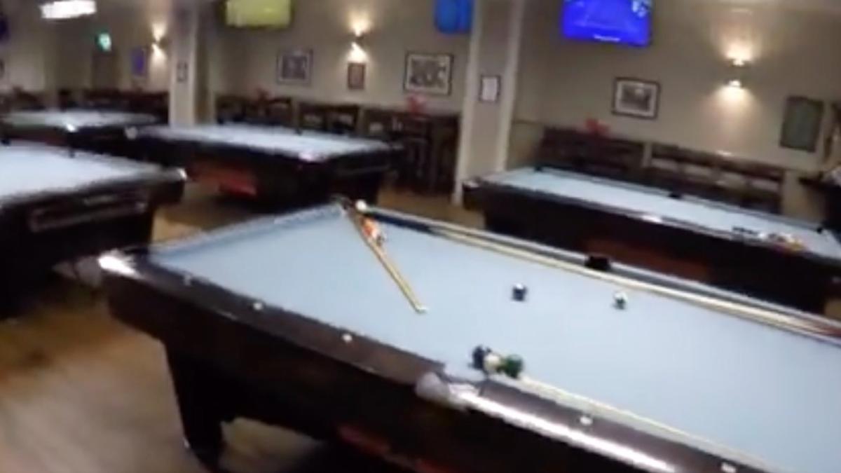 Watch this ridiculous billiards, golf trick shot that took 11 hours to build