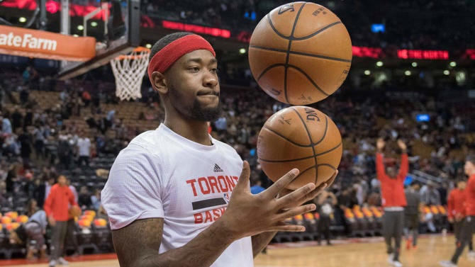Terrence Ross with basketballs