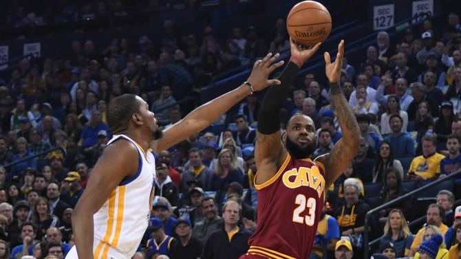 Kevin Durant contests LeBron James' shot
