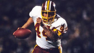 John Riggins and Joe Theismann of the Washington Redskins in action News  Photo - Getty Images