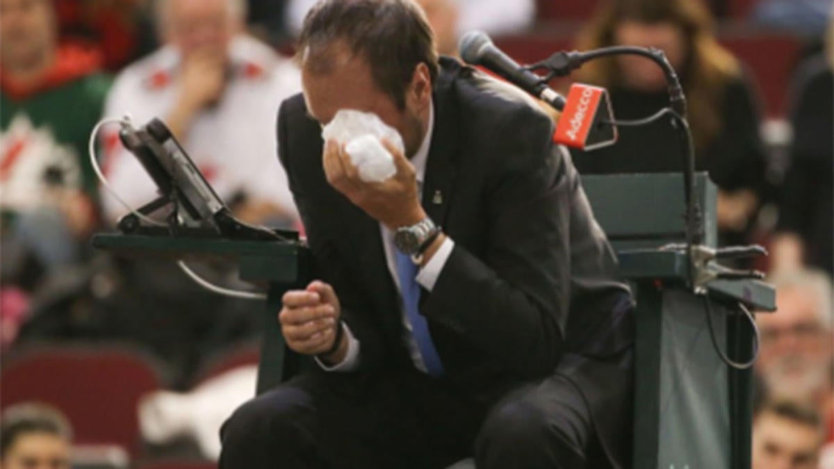 WATCH A tennis player gets mad and hits the umpire in the face with a