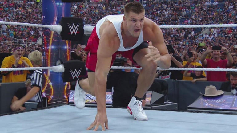 WATCH: Rob Gronkowski jumps in ring, tackles wrestler at 