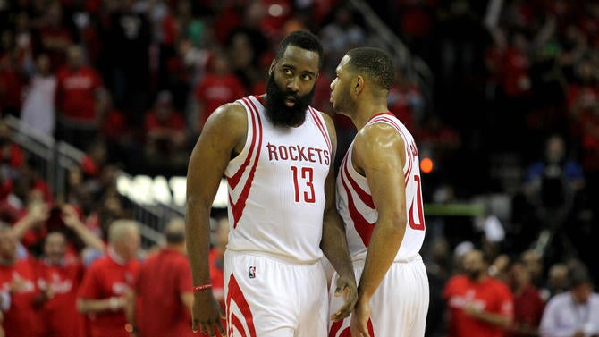 James Harden and Eric Gordon deliberate