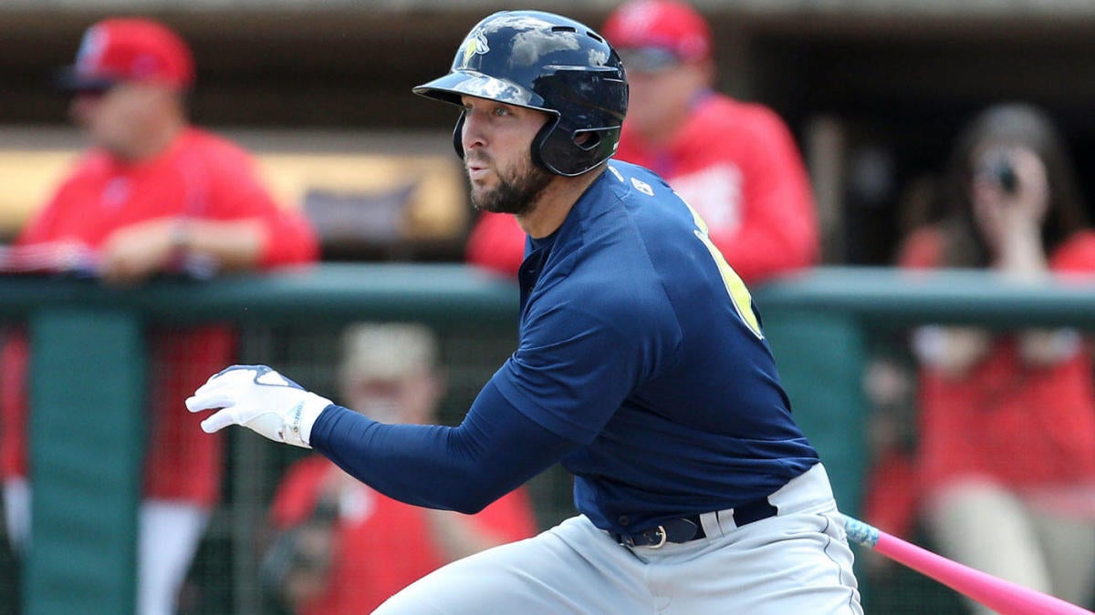 WATCH Tim Tebow sends bat flying into the stands