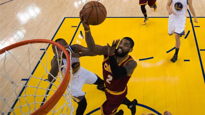 Kyrie Irving to the basket