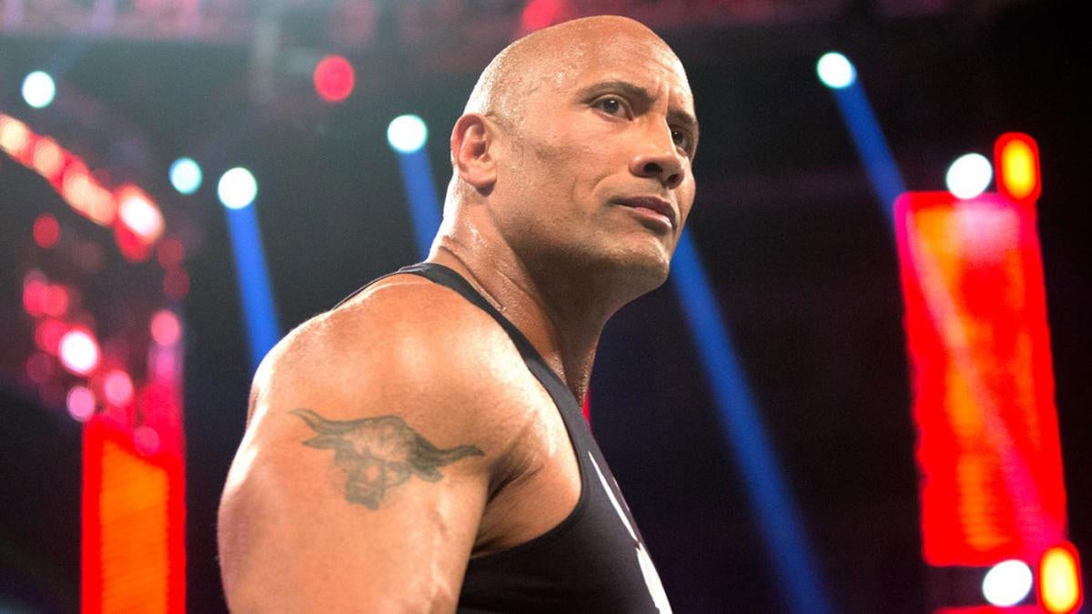 1. The Rock's iconic Brahma Bull shoulder tattoo - wide 2