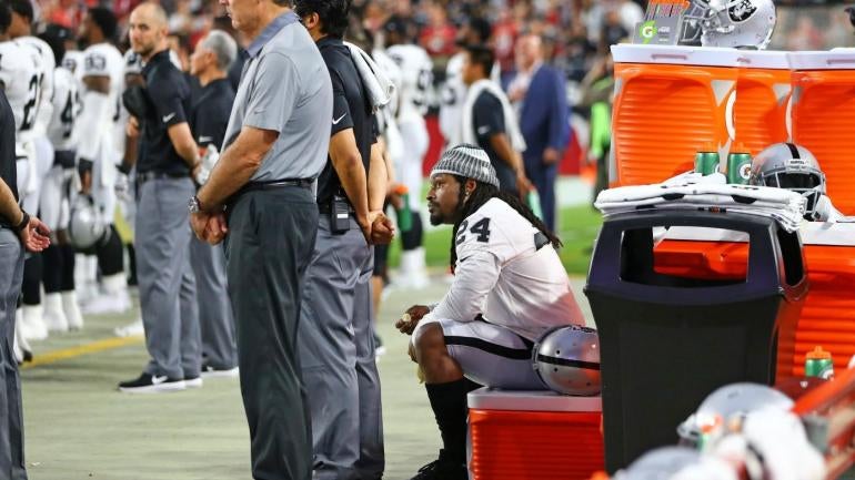 LOOK: Marshawn Lynch sits during national anthem before Raiders preseason game