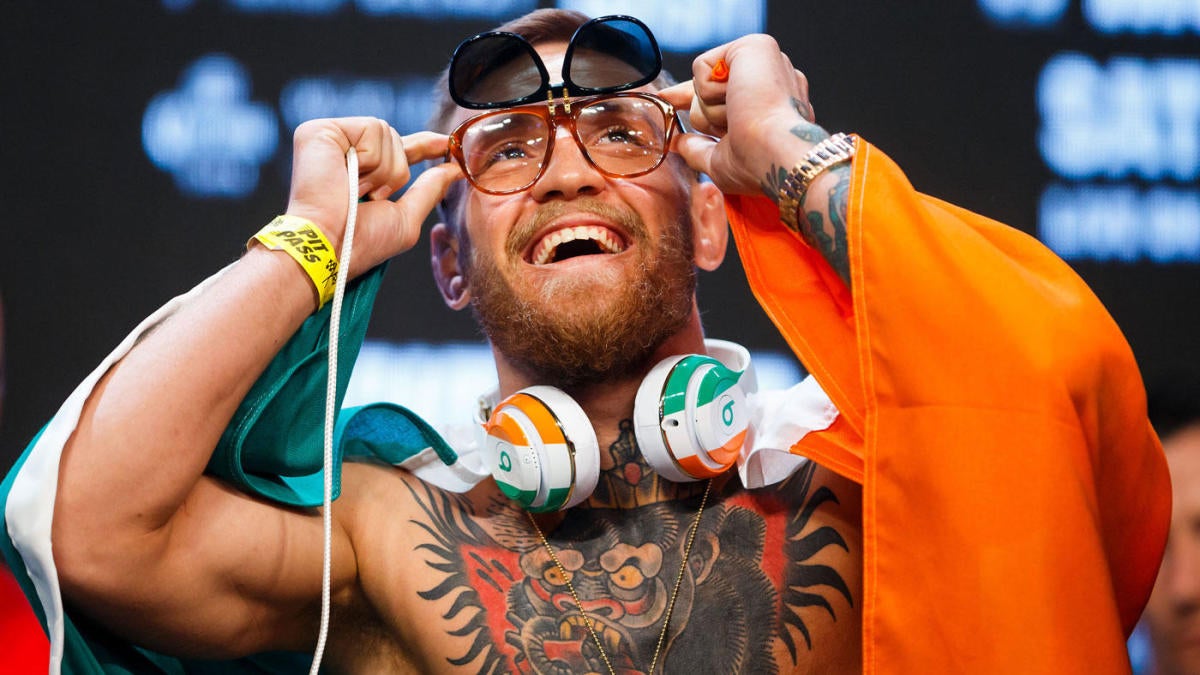 UFC, Reebok release comical Conor McGregor shirt ahead of 246 return fight - CBSSports.com