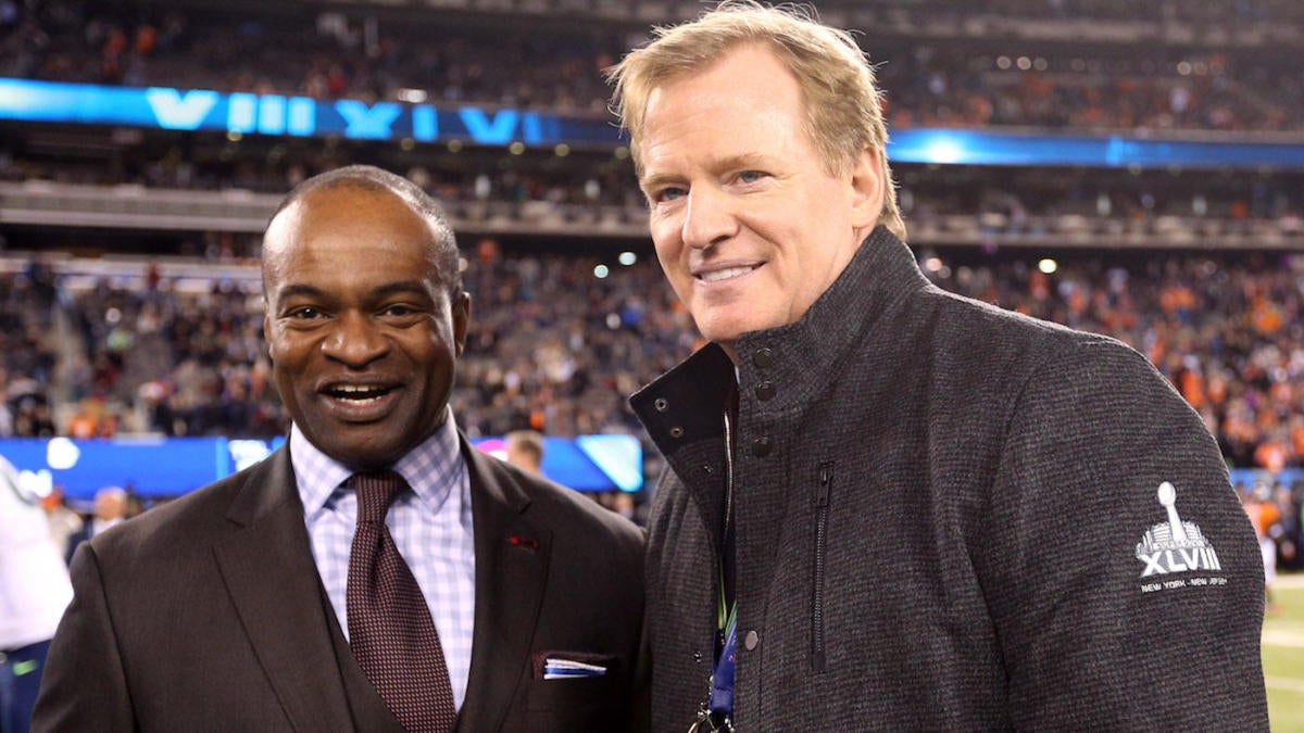 NFL Commissioner Roger Goodell and NFLPA Chief DeMaurice Smith meeting on the field "pictured here" 