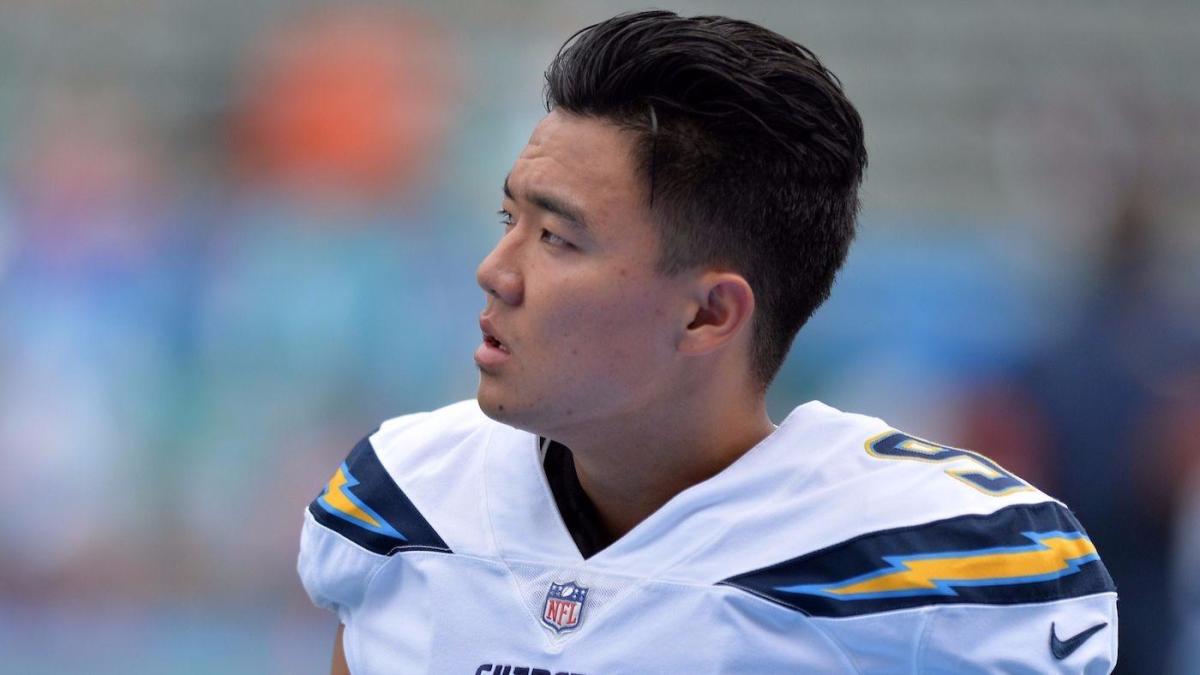 Atlanta Falcons kicker Younghoe Koo #7 looks on during pregame before the  game against the Los Angeles Charge…