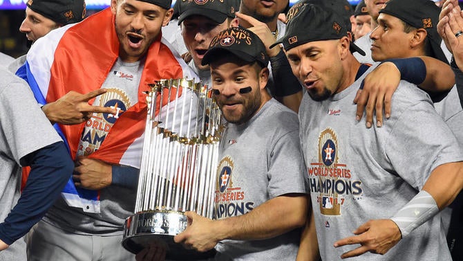 usatsi-10386833-springer-altuve-astros-trophy.jpg