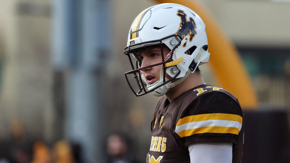 FILE – In this Oct. 22, 2016, file photo, Wyoming quarterback Josh Allen  reacts after scoring a touchdown in the second half of an NCAA college  football game against Nevada, in Reno